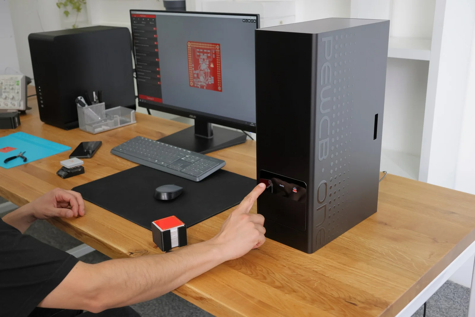 An engineer operating PewCB One at a laboratory workstation
